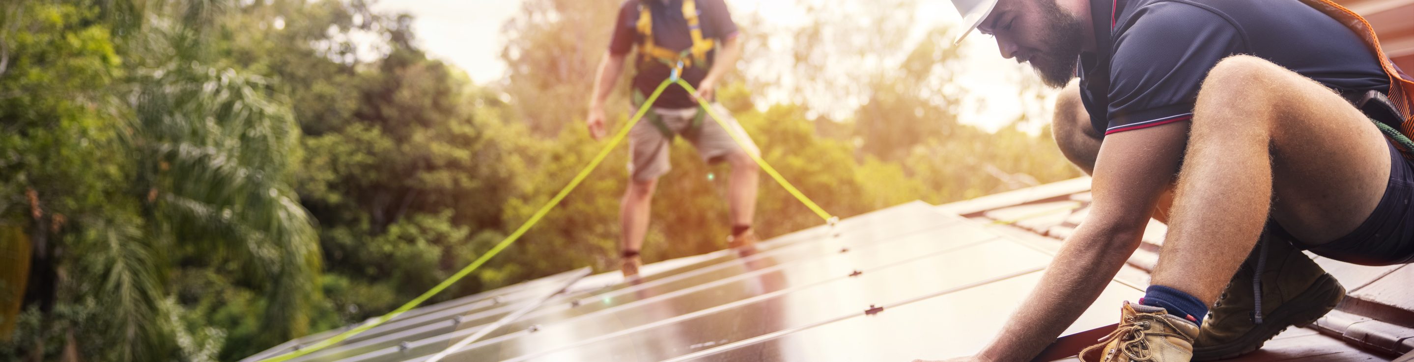 installing solar panels to set up a solar panel system